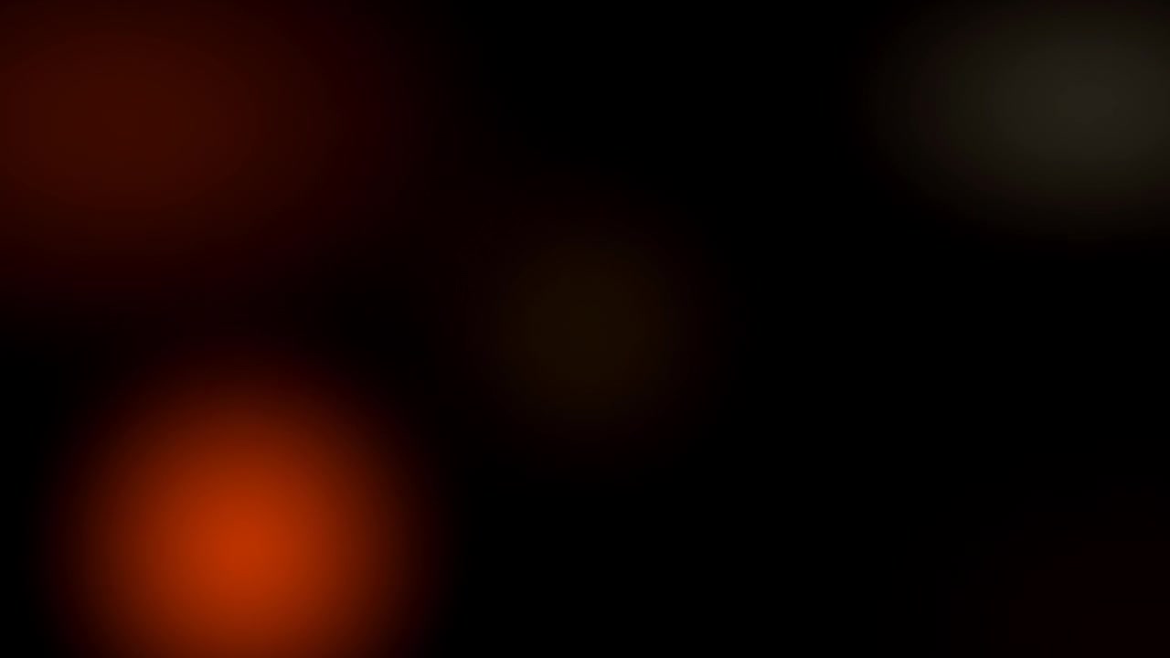 Yumuşak Parlayan Turuncu ve Beyaz Bokeh Işıklarıyla Soyut Arka Plan
