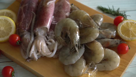 fresh seafood raw  on wooden board