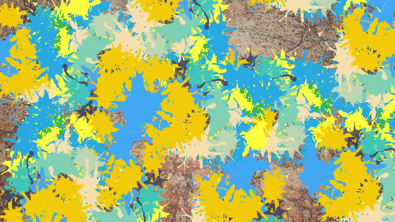 animación de múltiples manchas coloridas sobre la pared de ladrillo