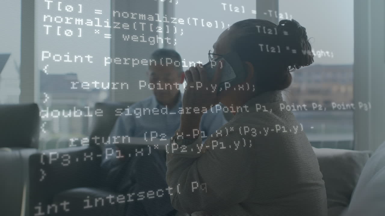 Data processing against african american businesswoman talking on smartphone at office