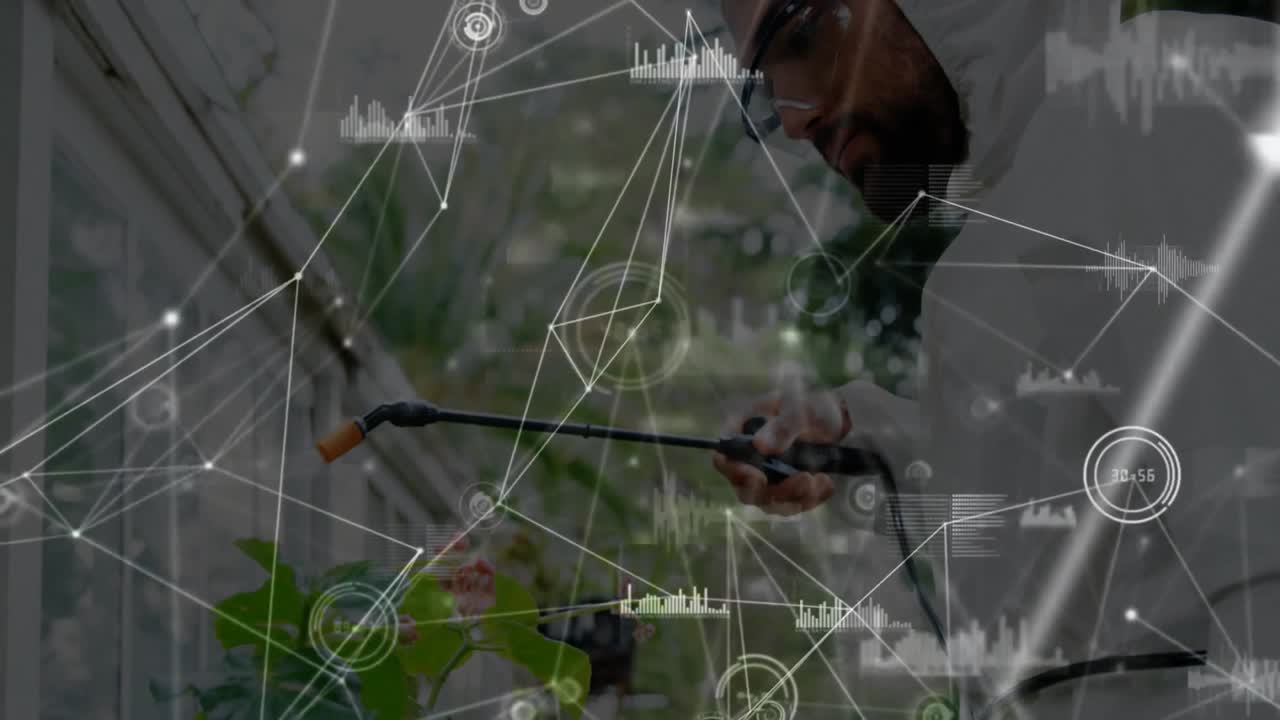 Greenhouse technician misting plants as animated data overlays appearing and tracking plant health