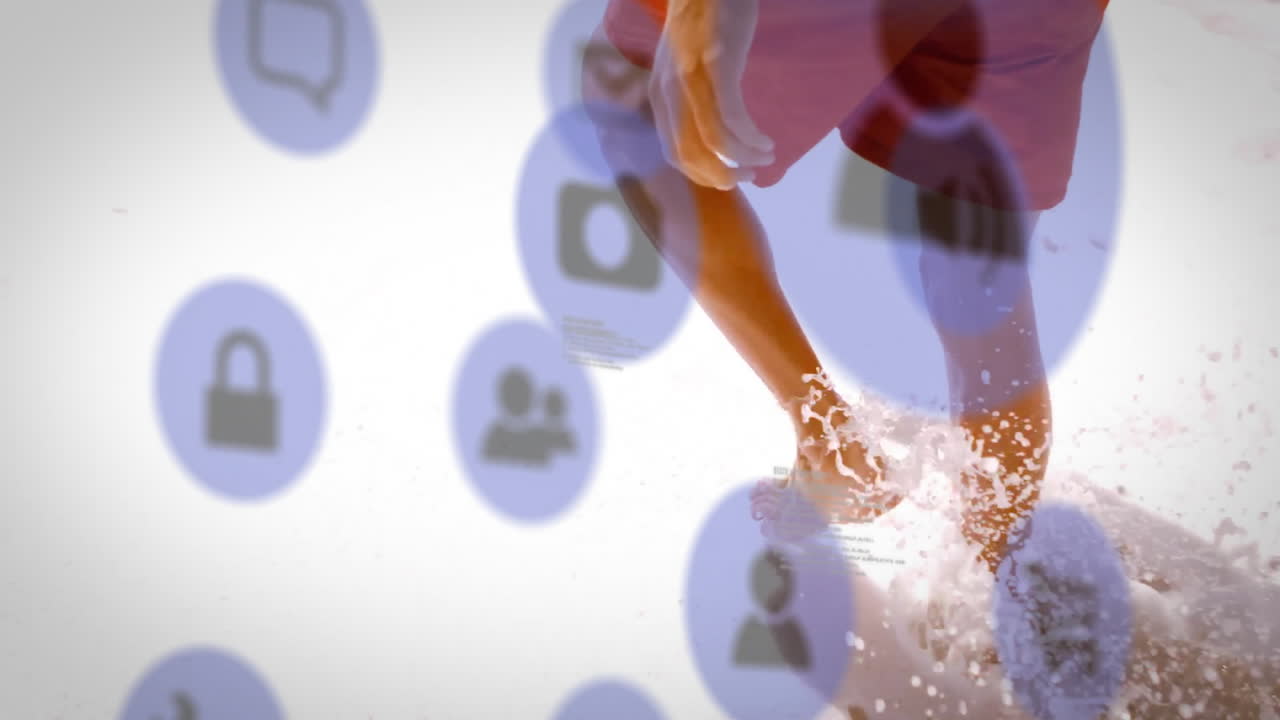 Running on beach, person surrounded by animation of social media icons