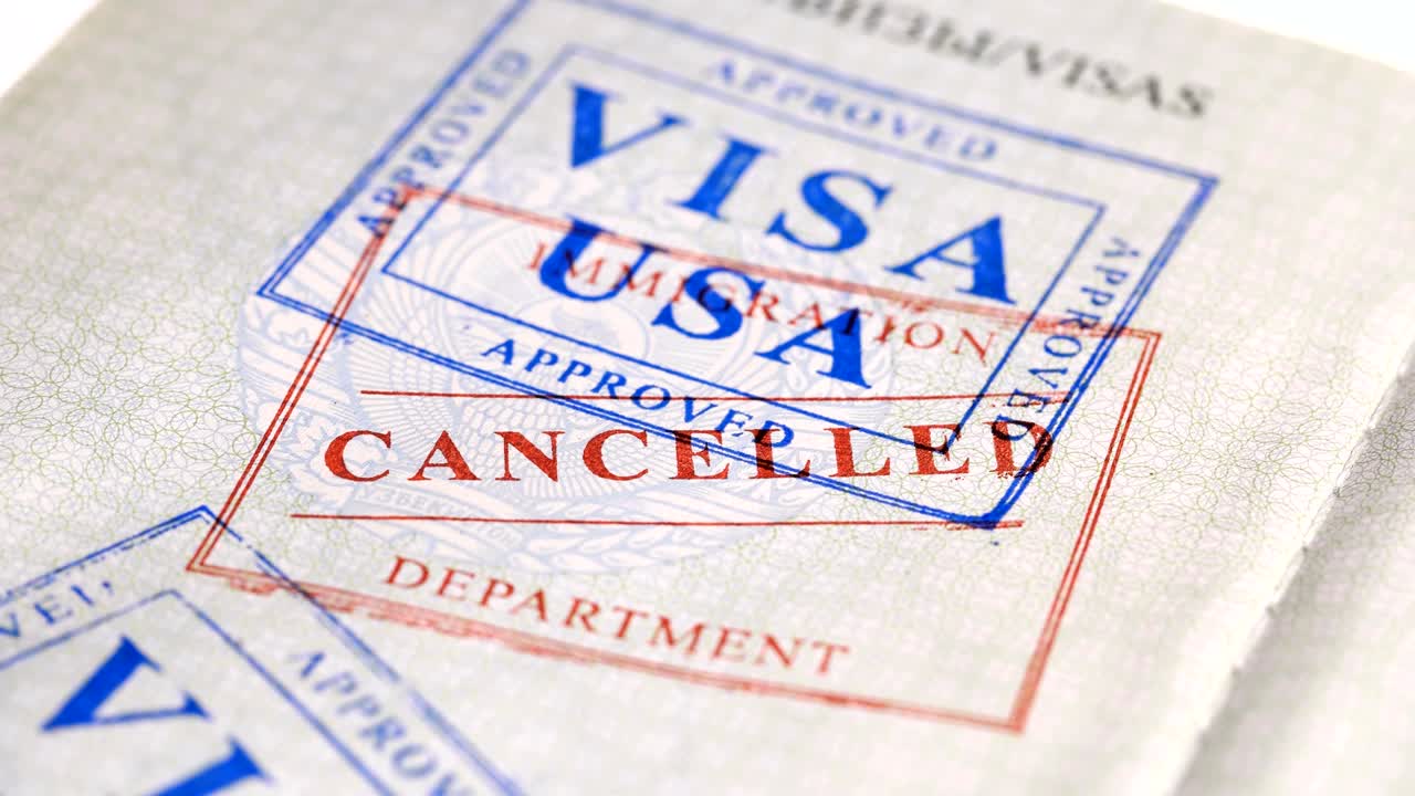 put a stamp in the passport: USA visa, canceled