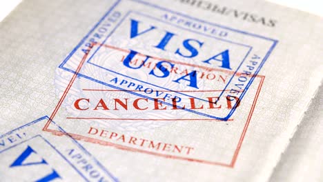 put a stamp in the passport: usa visa, canceled