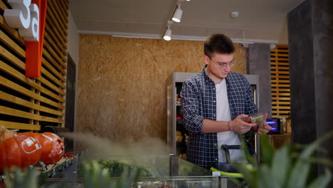 man shopping for groceries in a supermarket