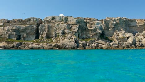 picturesque cala rossa cove at favignana island in sicily, italy