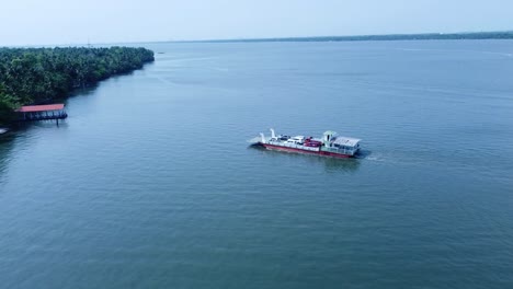 arial view of perumbalam island village and ferry boat service, alapuzha, kerala,india, boat jetty, bridge, vembanadu lake ,sky, blue lake , morning view.