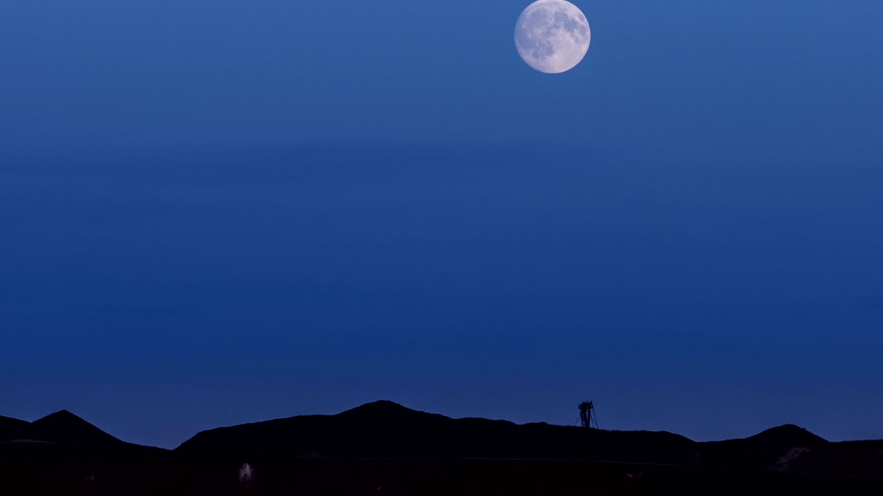 Super moon on the background of mining production.