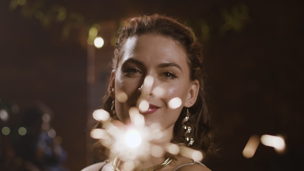 Woman with Sparkler at Party