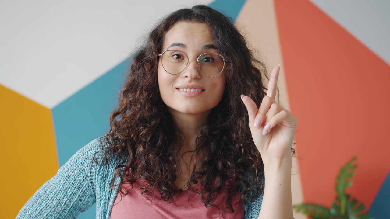 Woman with Curly Hair and Glasses in Different Expressions