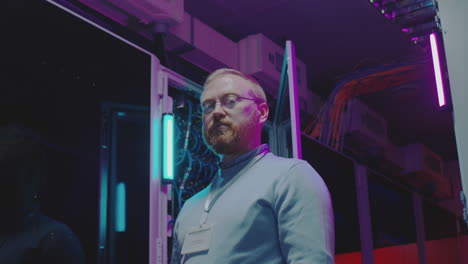 it professional in a data center with neon lights