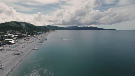 fishing boats on chase in a beach in mabua surigao