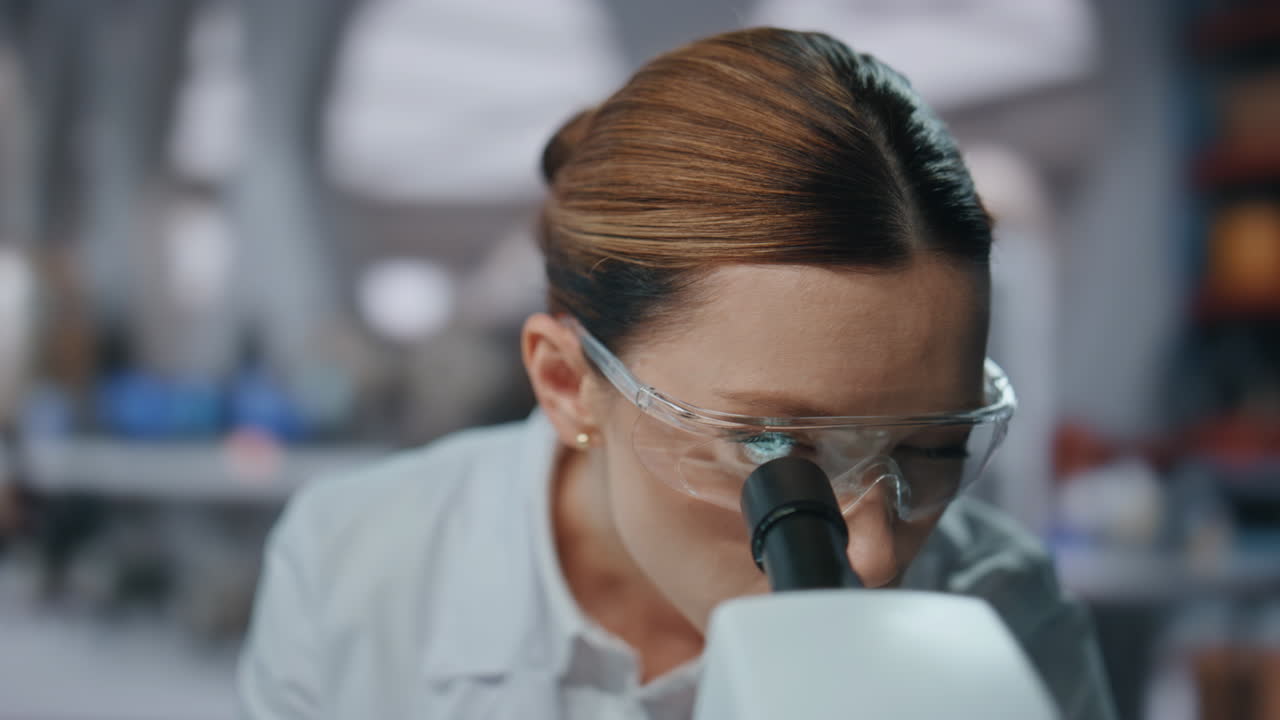 Biotechnology specialist developing medicines holding test tube close up.