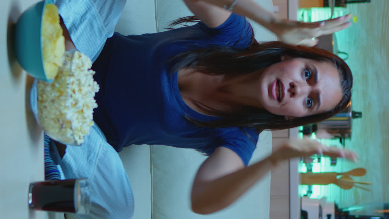 Vertical Video: Disappointed Sports Fan Watching At Favourite Team