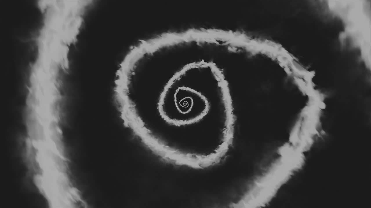 회전하는 추상적인 검은색과 색 불꽃 나선형