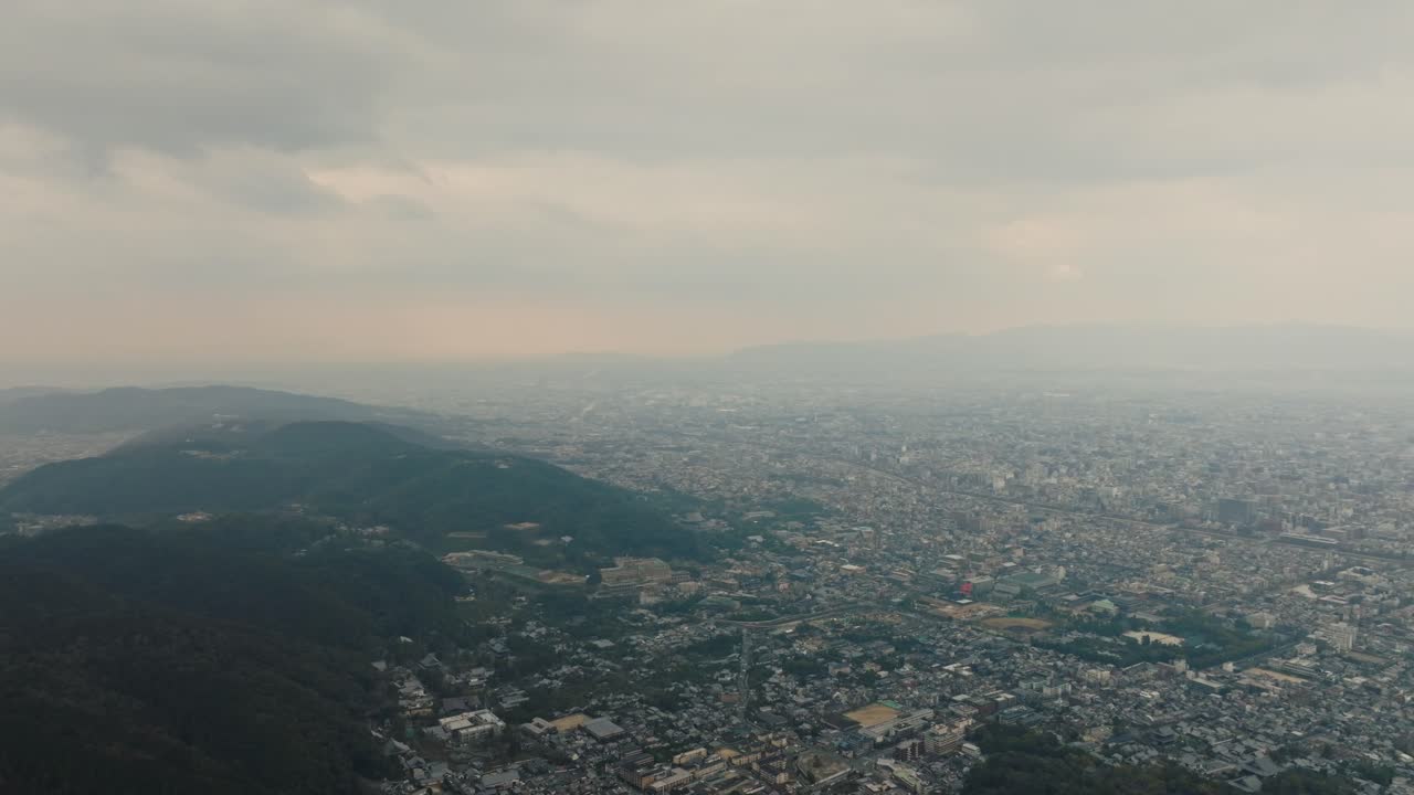 Aerial Drone View of Kyoto City Skyline from Daimonji Mountain, Ginkaku-ji Trail