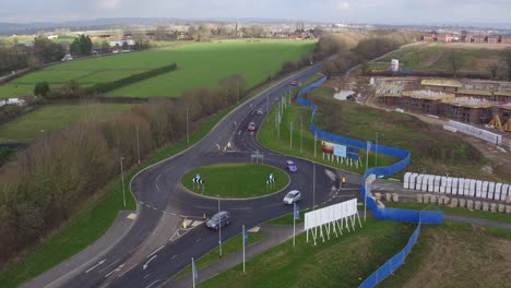 static aerial view of newly constructed roundabout in the uk