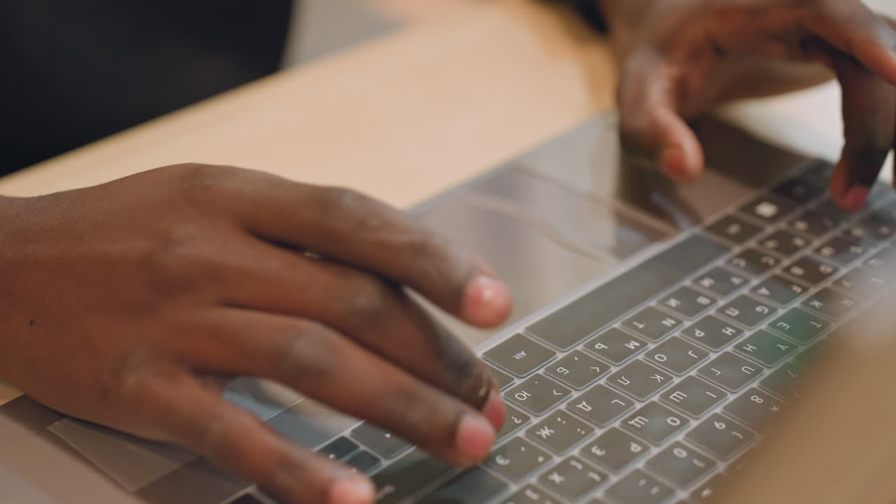 Developer revises complex software code. Individual intensely concentrates while debugging computer programs. Silently engaged developer finetunes intricate software scripts under soft desk lighting