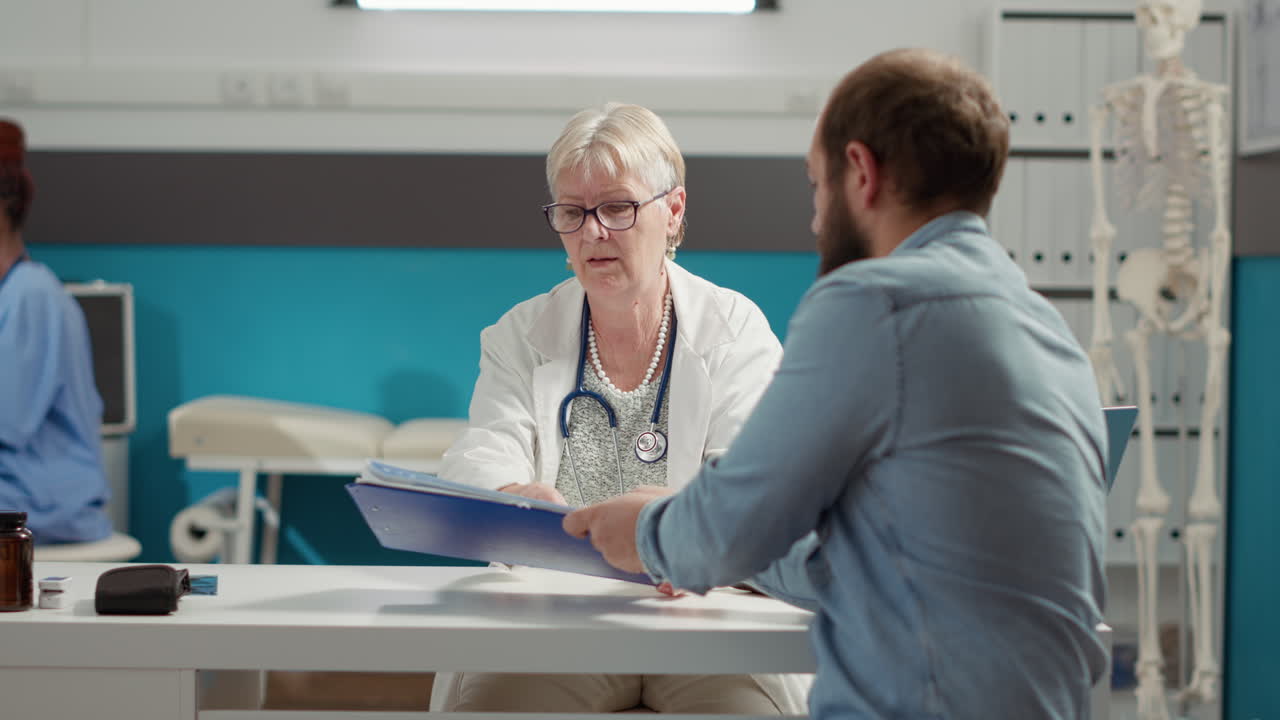 Male patient signing checkup appointment report on papers