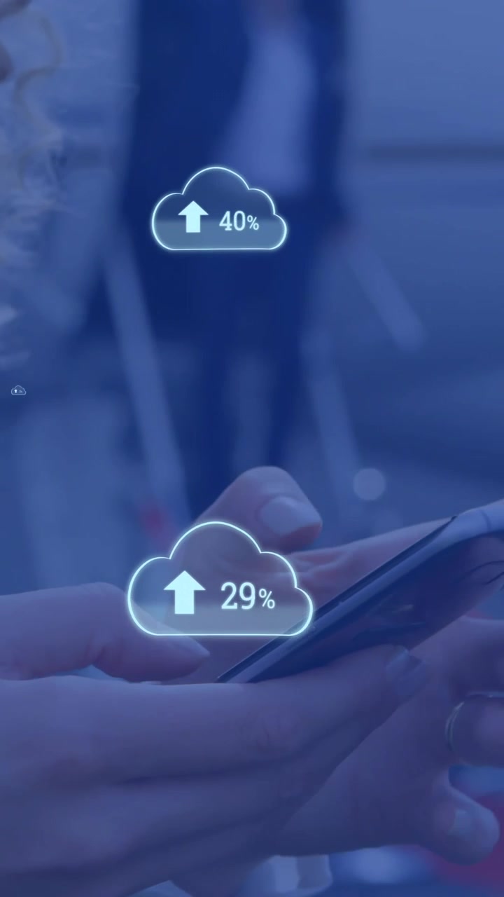 Animation of clouds with percents and arrows over caucasian businesswoman using smartphone