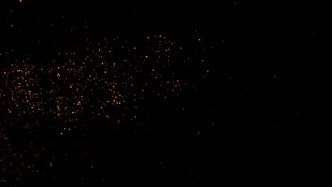 chispas de partículas de fuego y fuegos artificiales en fondo negro movimiento abstracto fondo animación gráfico de movimiento.