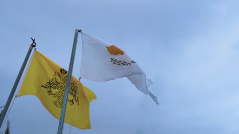 cyprus flag and another blow in the winds on the island