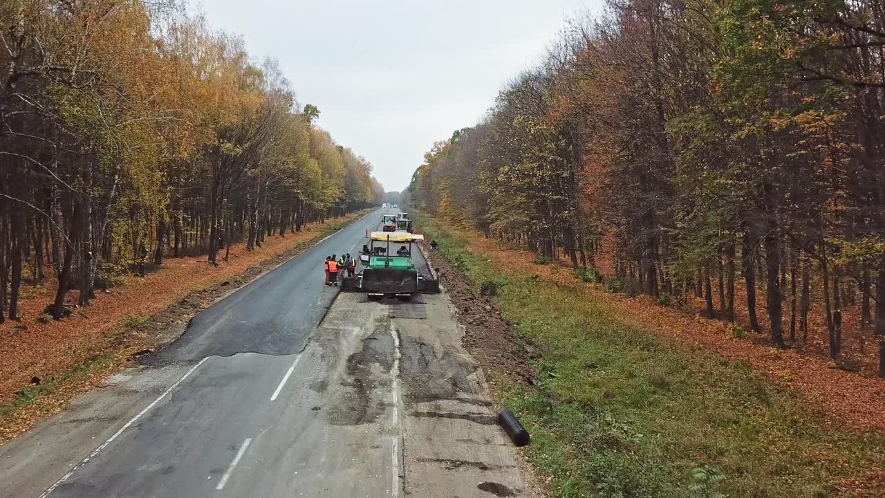 New road construction site. Laying the next layer of asphalt in the construction of a new road