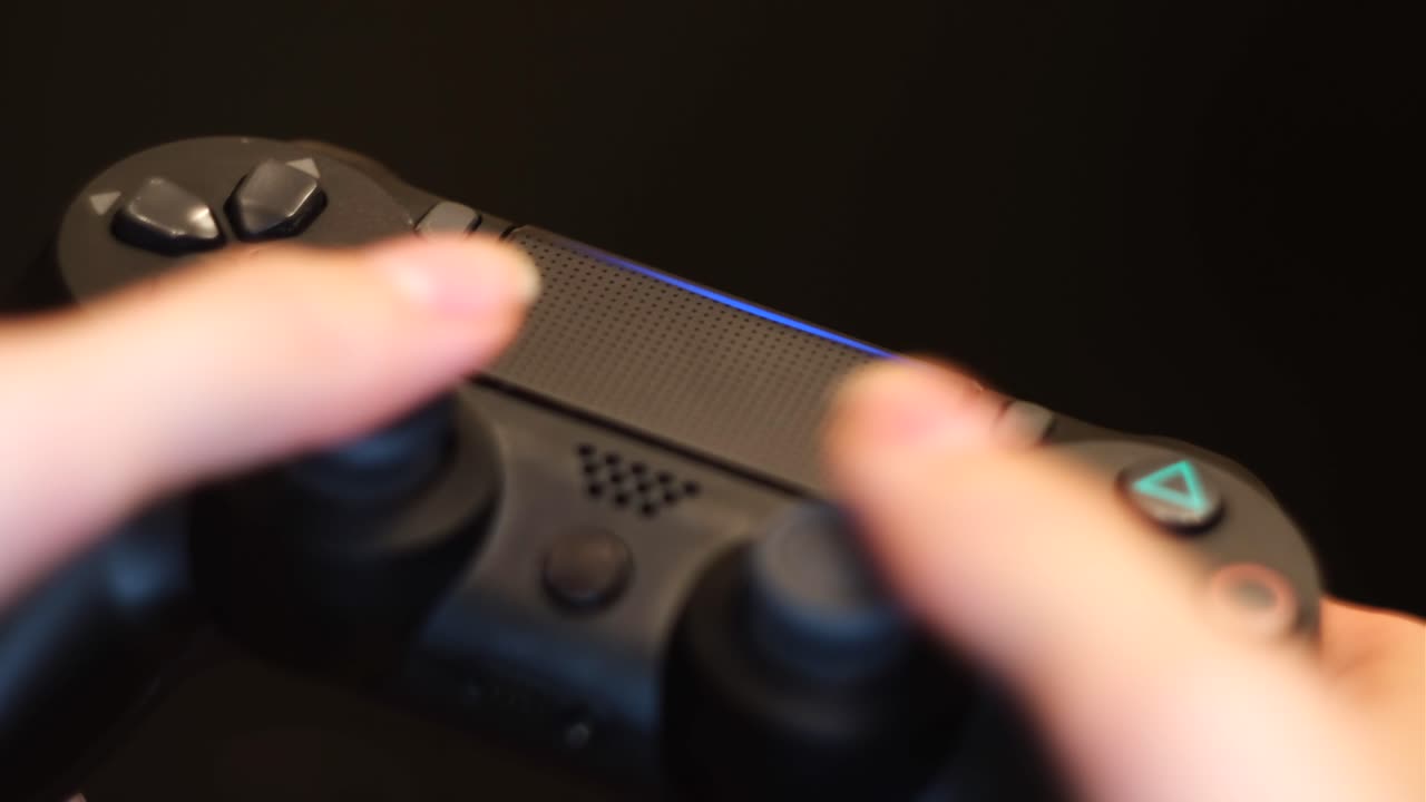 Hands on a gaming controller