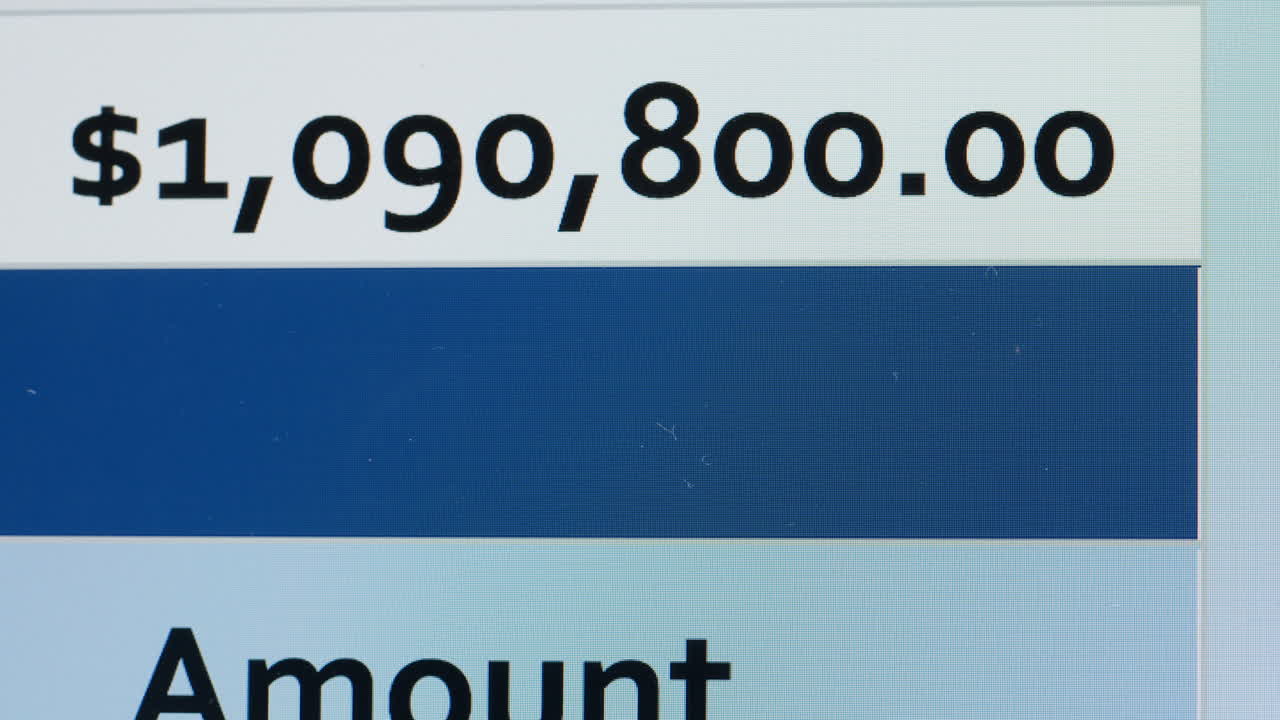 Digital Display Showing Scrolling Financial Data and Dollar Amounts
