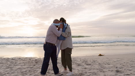 grandparents, child and family hug at beach