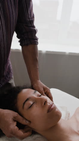 woman receiving a facial massage