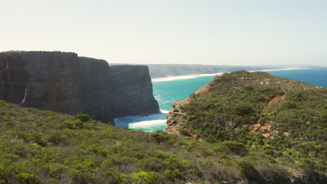 aerial: the cliffs near the town of arrifana in portugal