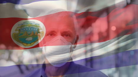 animación de la bandera de costa rica ondeando sobre un hombre caucásico con máscara facial en la calle de la ciudad