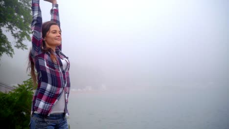 happy woman relaxing near sea. beautiful woman breathing fresh air