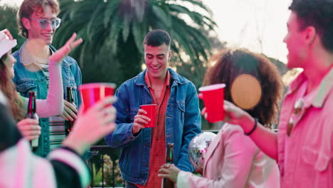 group of friends celebrating outdoors