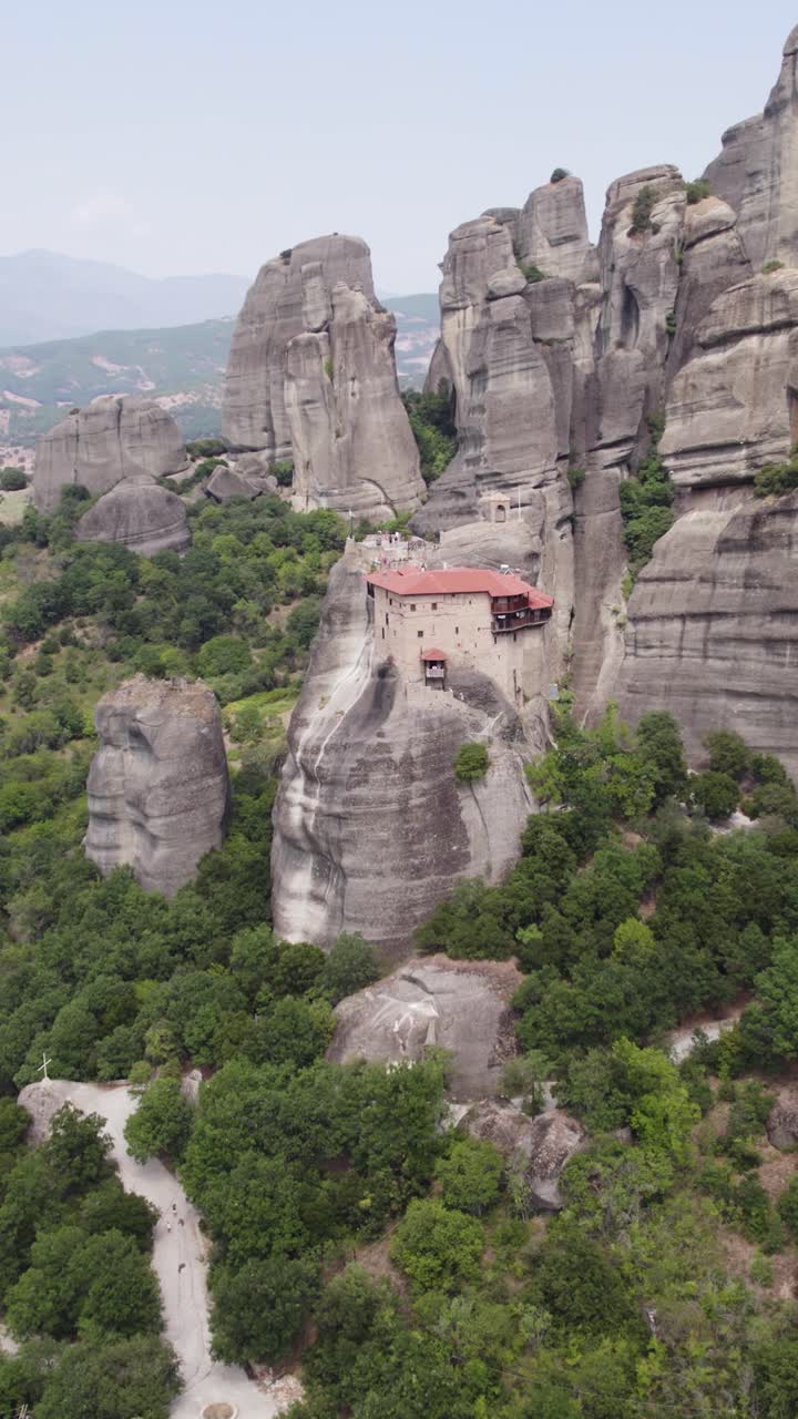 Vertical aerial view of Saint Nicholas Anapafsas Monastery in the Meteora monastery complex, Greece