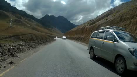 cruising on a bicycle at leh ladakh himalayas ghats pov