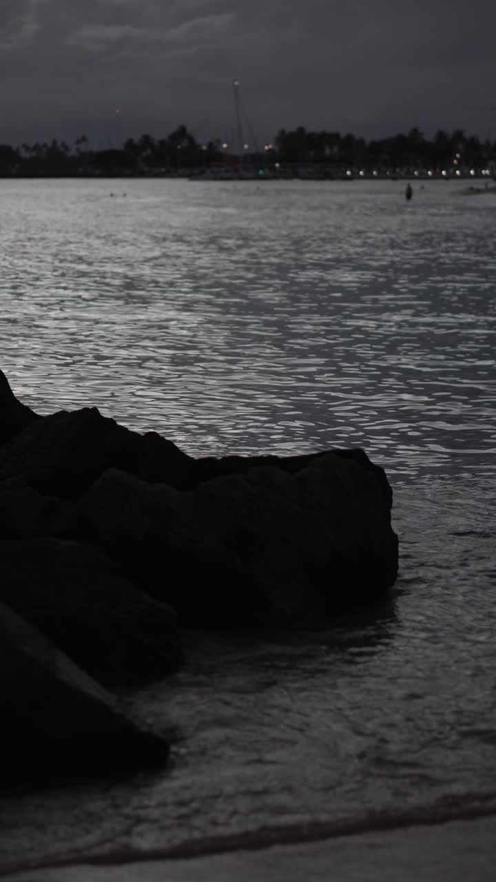 Vertical View of Twilight Above Waikiki Beach After Sunset, Honolulu, Hawaii USA