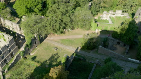 camera-panning-over-the-old-walls-of-a-castle-ruin-from-a-great-height