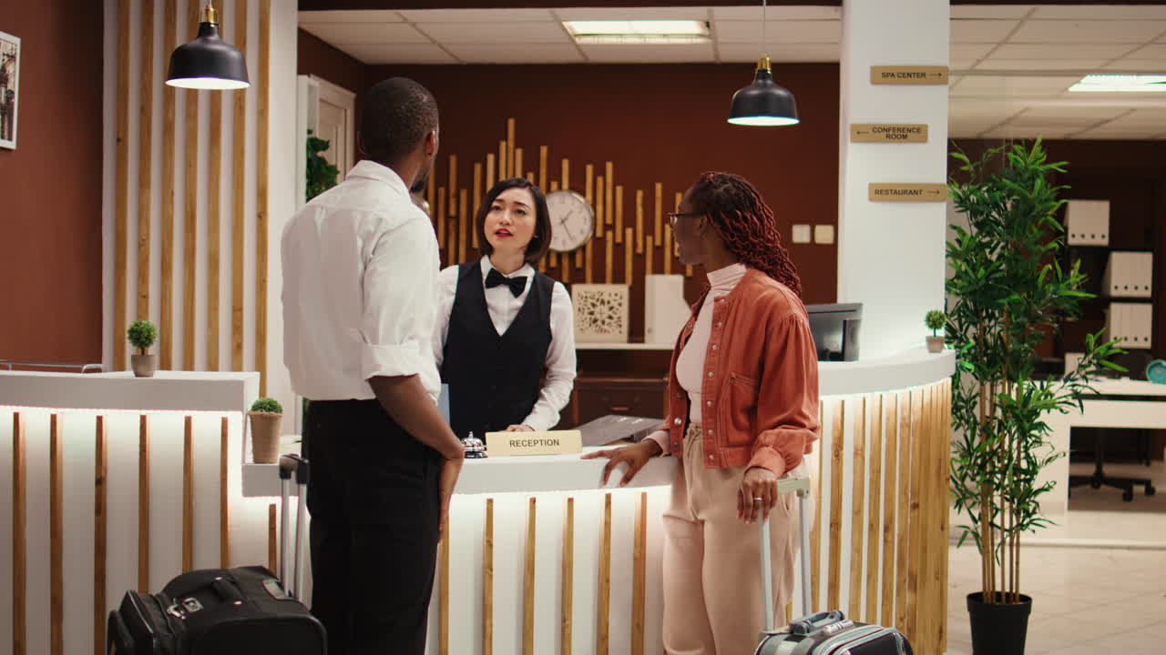 Hotel manager checking guests paperwork