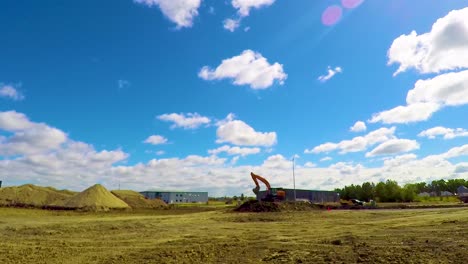 Excavator-preparing-to-load-dirt-into-a-truck-to-remove-from-site