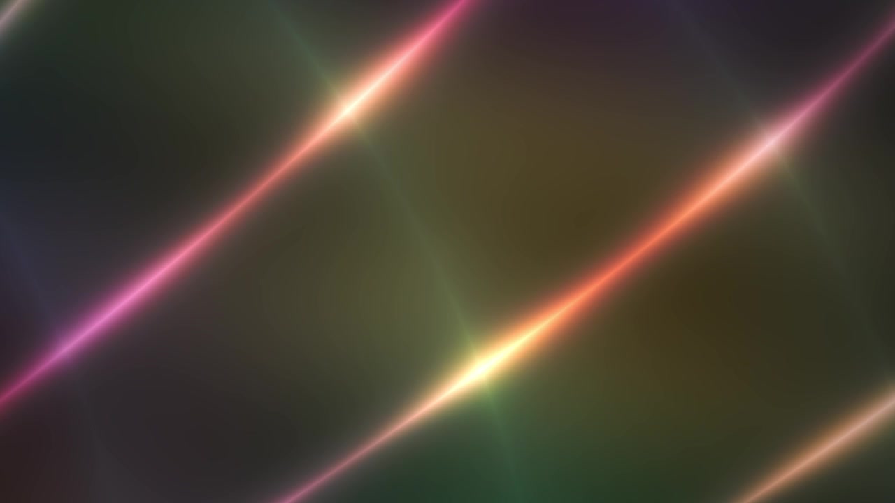 Dynamic Rainbow Light Flares Moving on a Dark Background