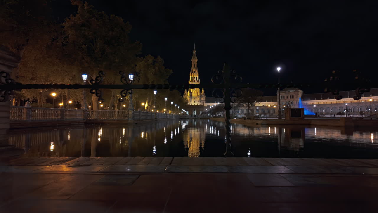 Side tower of Plaza de España at night. Seville, Andalusia, Spain