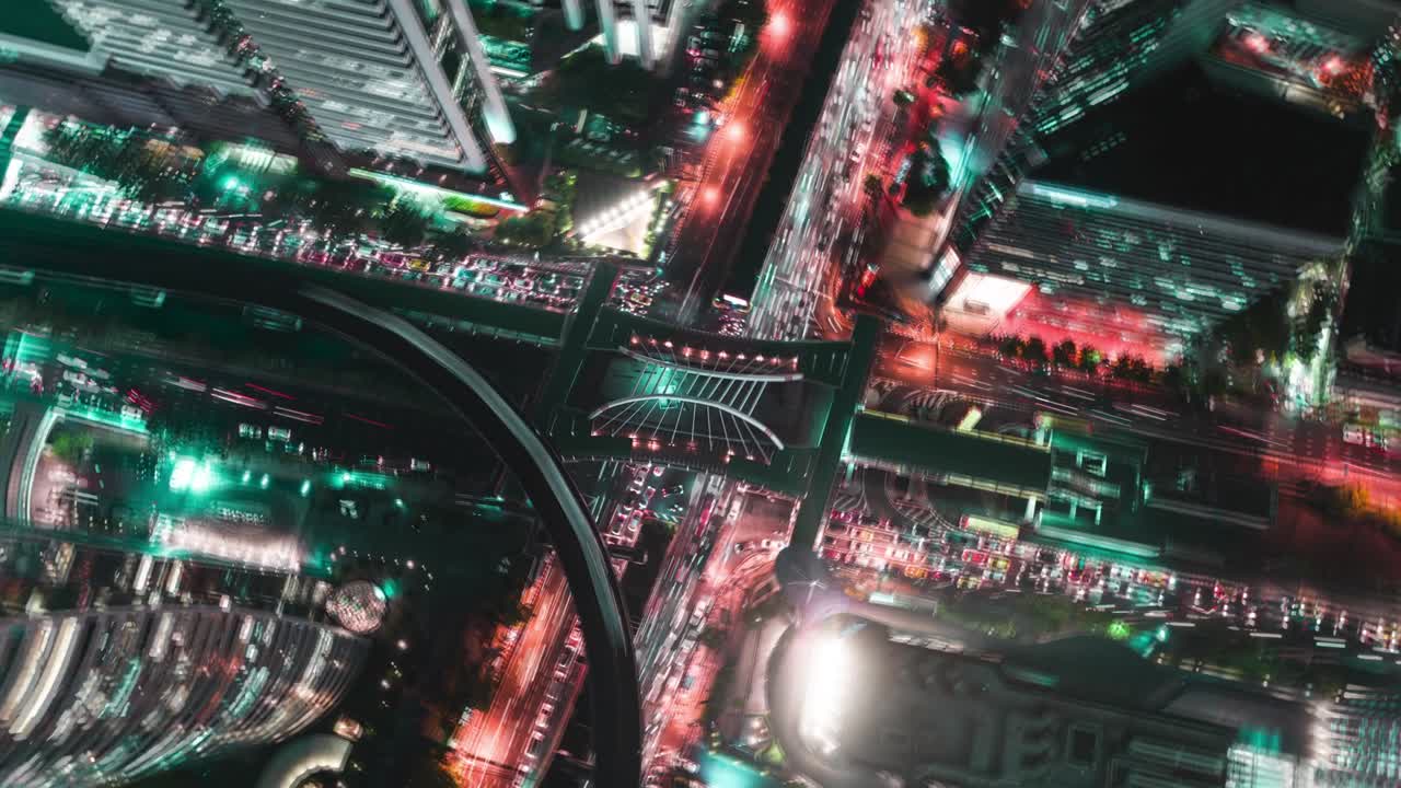 Time-lapse or Hyper-lapse Aerial view 4 way road stop circle or intersection traffic at night for transportation concept.