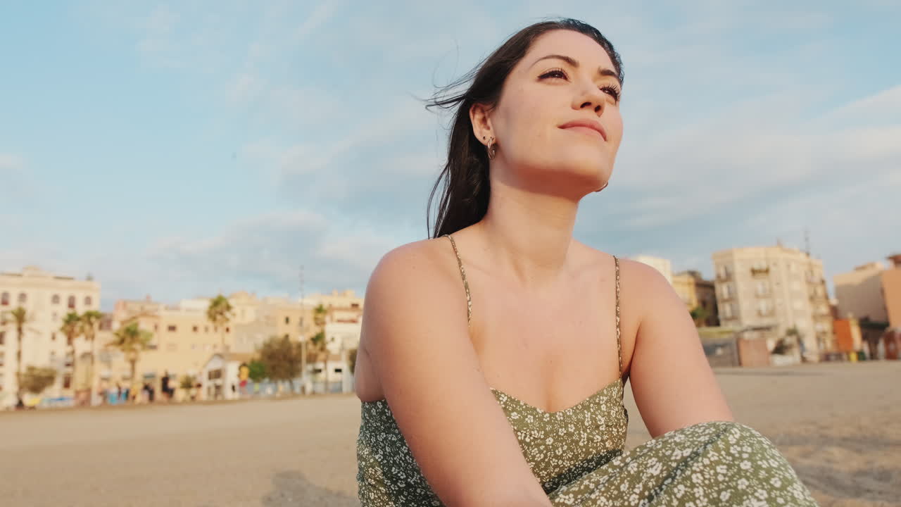 Woman Sitting on Beach