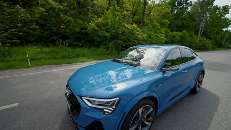 new modern car driving on the road. travel urban transport in motion.