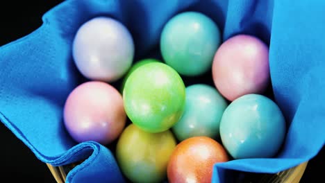 painted chocolate easter eggs in napkin