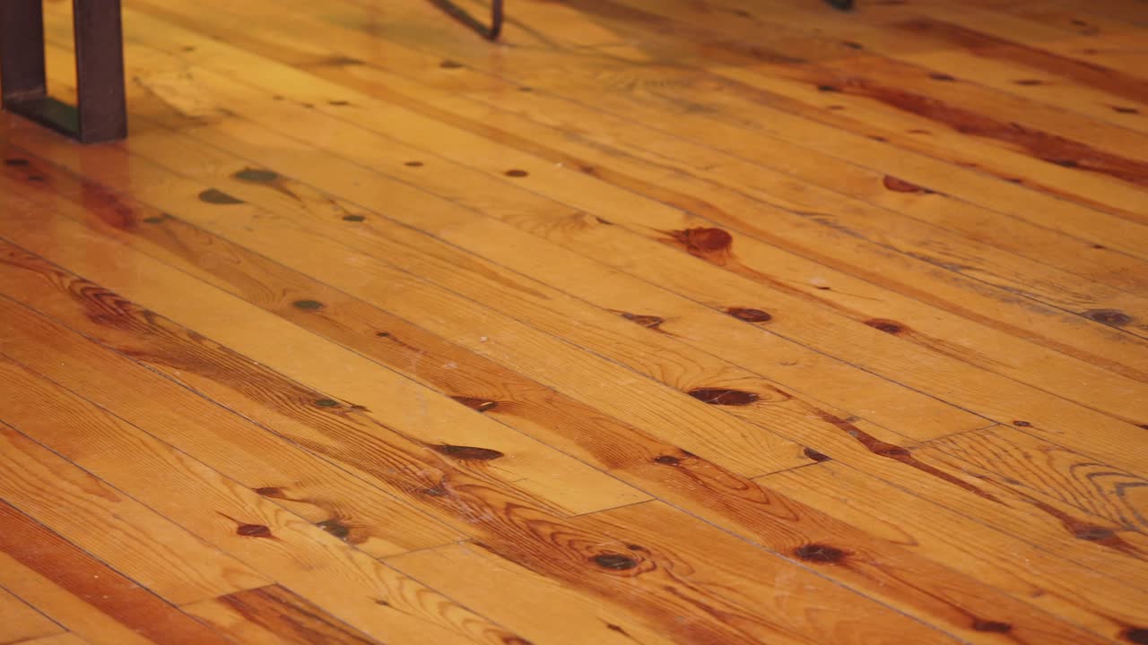 Warm Hardwood Floor with Natural Wood Grain and Knots