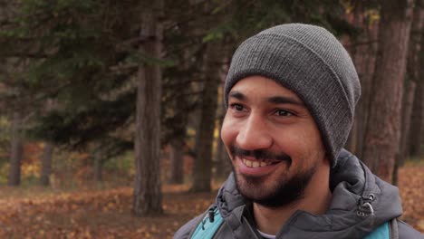 in autumn's embrace, a smiling hiker enjoys the serene beauty