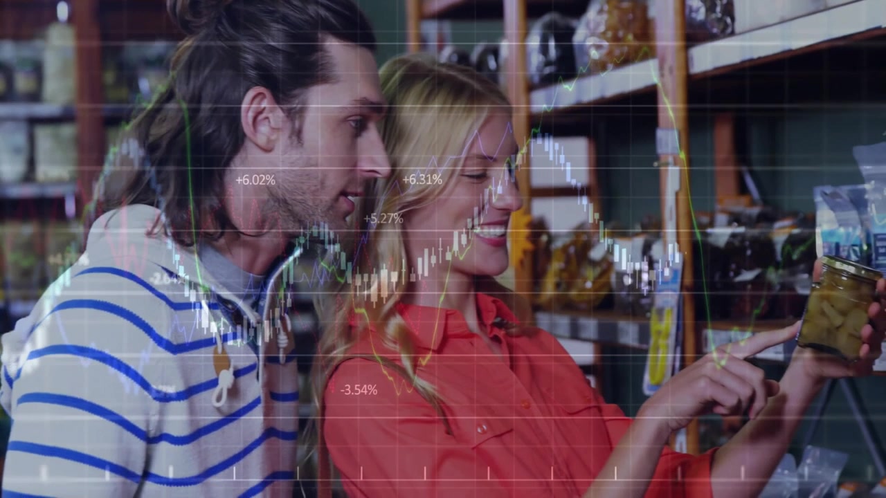Couple inspecting jar and reading label in aisle, graph overlay emerging, showing nutrition trend